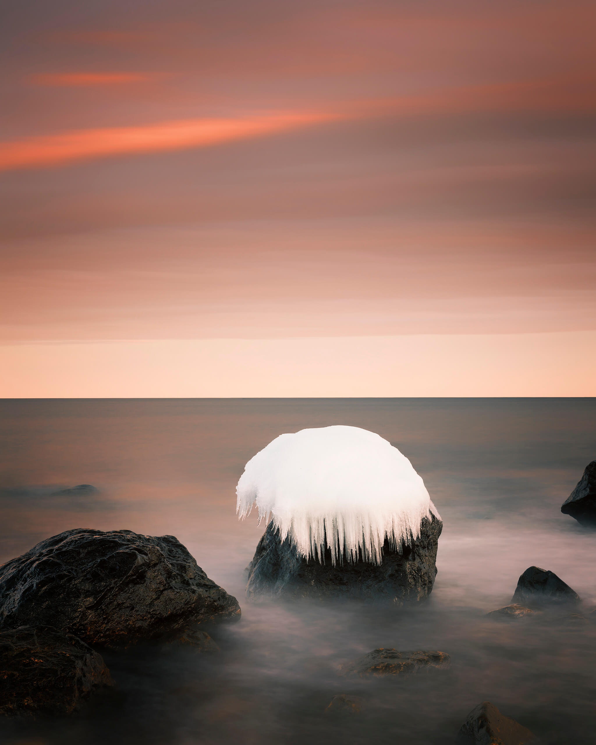 Resilient - photo of melting ice on a rock. Author Joakim Jormelin