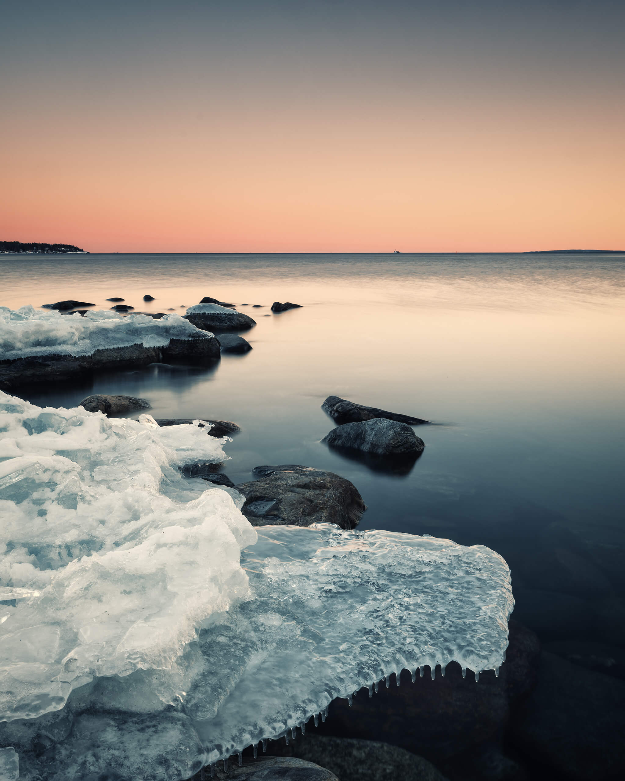 Sunset over an ice covered shore