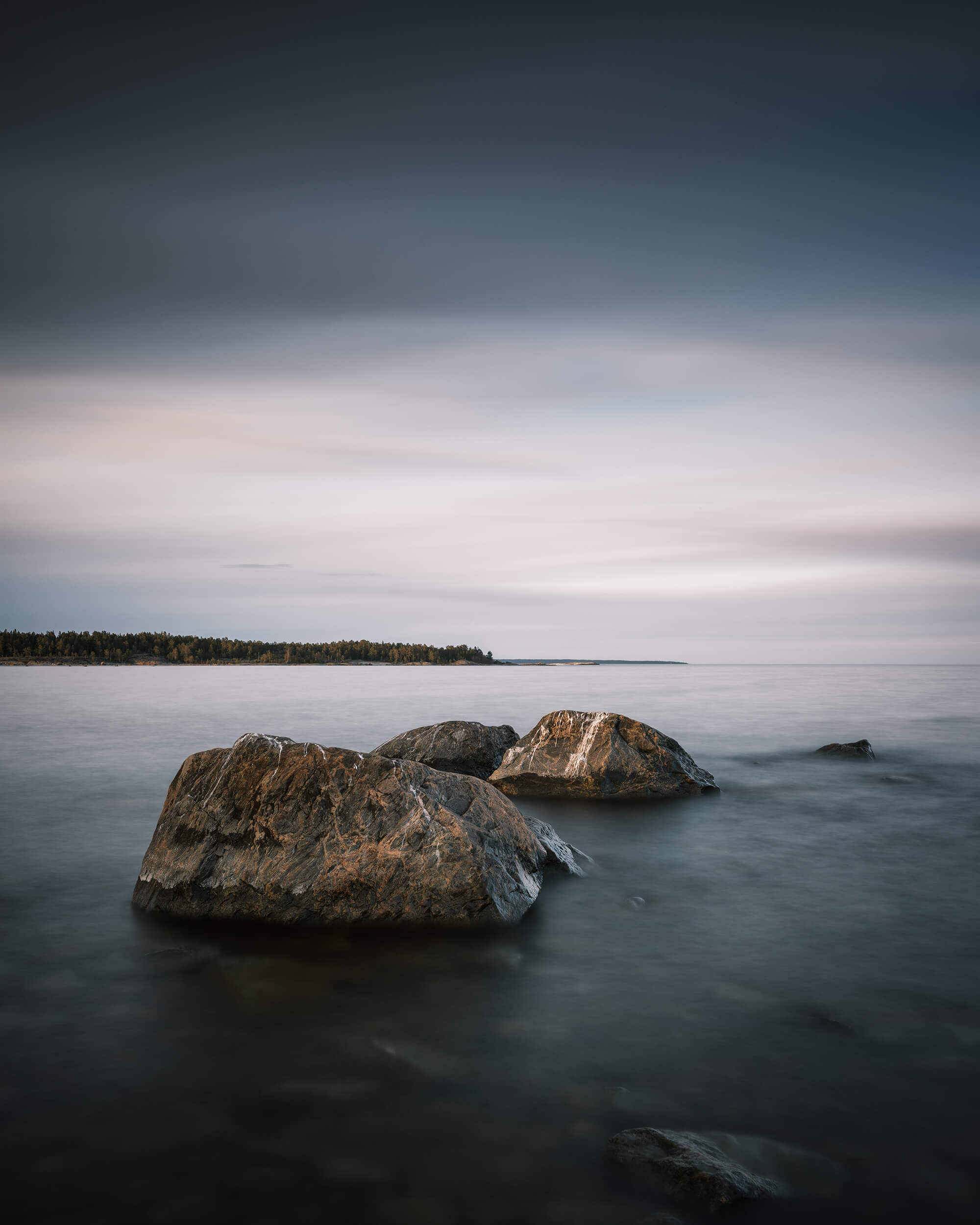 Trio - rocks by the sea by Joakim Jormelin